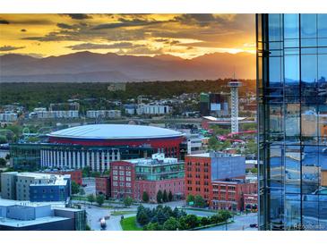Breathtaking aerial view showcasing the city skyline, mountains, and a vibrant urban landscape at sunset at 1133 14Th St # 1820, Denver, CO 80202
