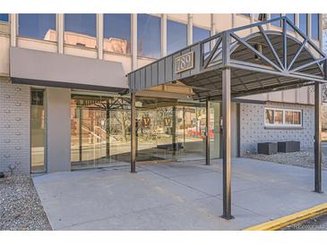 Welcoming building entrance featuring modern architectural design with glass doors at 789 N Clarkson St # 705, Denver, CO 80218