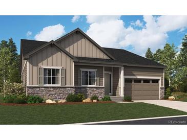 Charming single-Gathering home featuring stone accents, a two-car garage, and welcoming curb appeal at 2478 Bitterroot Pl, Highlands Ranch, CO 80129