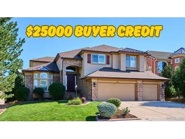Charming two-story home with stone accents, three-car garage and well-maintained landscaping at 1328 Double Eagle Ct, Castle Rock, CO 80104