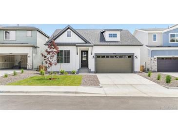 Charming single-Gathering home featuring a well-manicured front yard and inviting curb appeal at 5970 S Platte Canyon Dr, Littleton, CO 80123