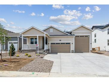 Inviting single-Gathering home boasting a charming front porch and a spacious two-car garage at 39171 Anthony St, Elizabeth, CO 80107