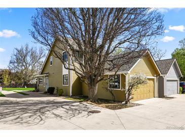 Charming two-story home with attached two car garage and mature landscaping at 4829 Baldwin Pl, Boulder, CO 80301