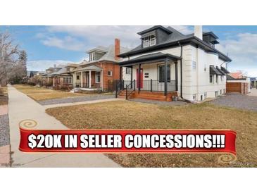 Charming two-story home with a welcoming front porch and well-maintained lawn at 3800 Umatilla St, Denver, CO 80211