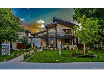 Striking contemporary home with architectural design and professionally landscaped front yard at 1175 S Jackson St, Denver, CO 80210