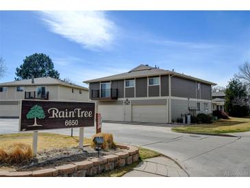 Beautiful townhome community with well-maintained landscaping and attached garages at 6650 E Arizona Ave # 138, Denver, CO 80224