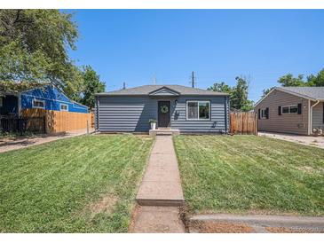Charming single-story home with well-maintained lawn and inviting walkway at 2465 W Mosier Pl, Denver, CO 80223