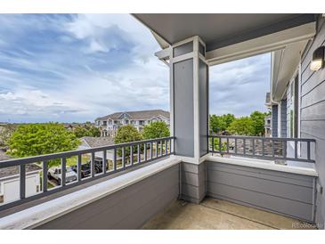 Relax on your private balcony overlooking the neighborhood at 5255 Memphis St # 224, Denver, CO 80239
