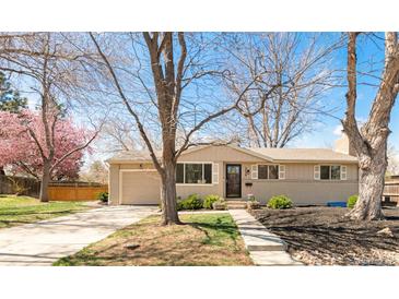 Charming ranch-style home with neutral paint, landscaped front yard, and inviting curb appeal at 2756 E Euclid Ave, Centennial, CO 80121