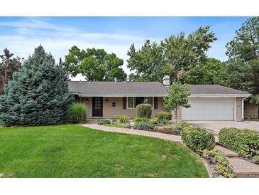 Charming ranch home with landscaped yard and attached garage at 3131 S Leyden St, Denver, CO 80222