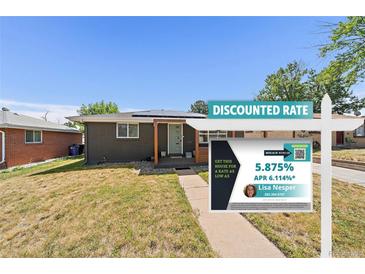 Charming single-story home with well-maintained lawn and appealing curb appeal at 1742 S Alcott St, Denver, CO 80219