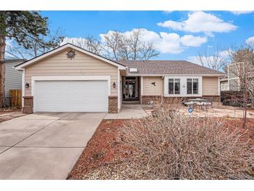 Charming single-story home featuring a two-car garage, cozy patio, and well-maintained landscaping at 16084 E Lehigh Cir, Aurora, CO 80013