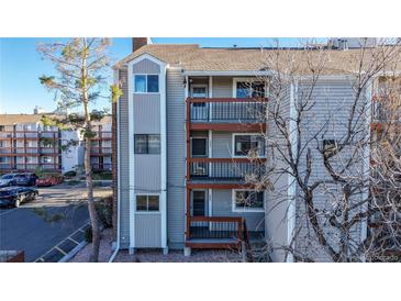 Three-story building with multiple balconies and parking at 8625 Clay St # 227, Westminster, CO 80031