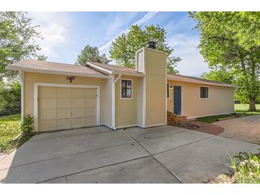 Charming single-story home with an attached garage and cozy curb appeal at 6396 Twin Lakes Rd, Boulder, CO 80301