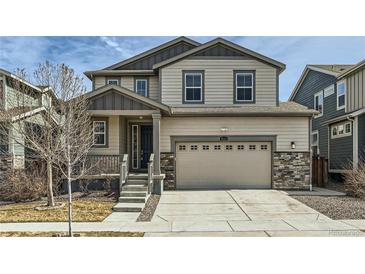 Charming two-story home with a two car garage, and neutral color palette at 9544 Pitkin St, Commerce City, CO 80022