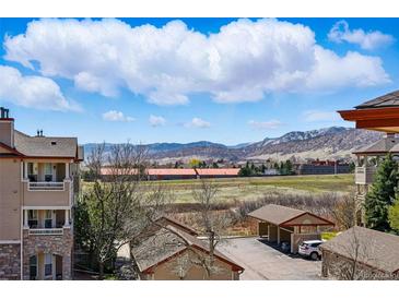 Scenic exterior view with expansive landscape and mountain backdrop under a clear sky at 9557 W San Juan Cir # 306, Littleton, CO 80128