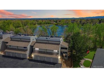 Stunning end unit offers garage parking, near a lake and neighborhood playground at 10550 W Jewell Ave # 301, Lakewood, CO 80232