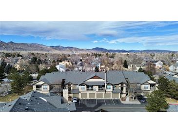 Charming townhome boasts scenic mountain views and convenient garage parking at 7402 S Quail Cir # 1116, Littleton, CO 80127