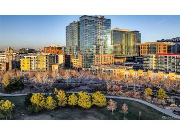 A captivating aerial view showcases Denver's cityscape and vibrant park, offering an urban oasis at 1700 Bassett St # 504, Denver, CO 80202