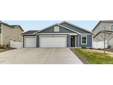 Charming single Gathering home featuring a three-car garage and beautifully painted exterior at 523 Beckwourth Ave, Fort Lupton, CO 80621