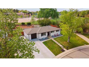 Charming single-story home with a well-manicured front yard and a welcoming entrance at 45 S Reed St, Lakewood, CO 80226