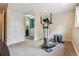 View of basement exercise room near laundry area and closet for convenience at 693 Delwood Ct, Highlands Ranch, CO 80126