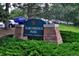 The Northridge Park sign, landscaped with bushes, located in Metro Districts Highlands Ranch at 693 Delwood Ct, Highlands Ranch, CO 80126