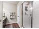 Clean bathroom features a glass-enclosed shower and convenient towel storage at 1914 Villageview Ln, Castle Rock, CO 80104