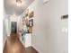 Warm entryway with hardwood floors and decorative wall art at 1914 Villageview Ln, Castle Rock, CO 80104