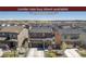 Charming two-story home with stone accents, a well-kept lawn, and a paved driveway in a Gathering-friendly neighborhood at 1914 Villageview Ln, Castle Rock, CO 80104