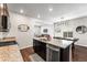 Bright kitchen with granite countertops and modern stainless steel appliances at 1914 Villageview Ln, Castle Rock, CO 80104