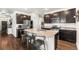 Spacious kitchen with granite countertops, stainless steel appliances, and a large island at 1914 Villageview Ln, Castle Rock, CO 80104