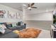 Upstairs living room offering a sectional sofa and an area rug at 1914 Villageview Ln, Castle Rock, CO 80104