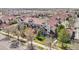 Aerial shot of townhomes and community with mature trees and landscaping at 12711 Colorado Blvd # 1009, Thornton, CO 80241