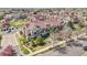 Aerial view of townhomes, showing landscaping and street at 12711 Colorado Blvd # 1009, Thornton, CO 80241