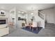 Cozy dining area with seating for four, next to stairway and living area at 12711 Colorado Blvd # 1009, Thornton, CO 80241