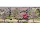 Exterior of a townhouse with flowering trees and shrubs at 12711 Colorado Blvd # 1009, Thornton, CO 80241