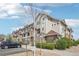 Exterior view of a multi-story home with well maintained landscaping at 12711 Colorado Blvd # 1009, Thornton, CO 80241