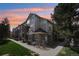 Beautiful multi-story building with a well maintained lawn and sidewalk at 12711 Colorado Blvd # 1009, Thornton, CO 80241