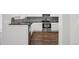 Modern kitchen with stainless steel appliances, sleek black countertops and mosaic tile backsplash at 12711 Colorado Blvd # 1009, Thornton, CO 80241