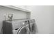 Modern laundry room featuring a Samsung washer and dryer set at 12711 Colorado Blvd # 1009, Thornton, CO 80241
