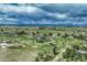 Vast aerial shot showcasing homes set amid rolling hills and expansive open spaces at 10534 Inspiration Dr, Parker, CO 80138
