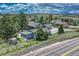 High-angle shot of home featuring a cozy guesthouse, surrounded by greenery in a quiet neighborhood at 10534 Inspiration Dr, Parker, CO 80138