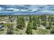 Distant aerial view of a house nestled among trees, offering a sense of seclusion and privacy at 10534 Inspiration Dr, Parker, CO 80138