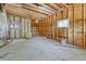 Unfinished basement with exposed framing, insulation, and natural light at 10534 Inspiration Dr, Parker, CO 80138