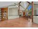 Spacious living room features vaulted ceilings, a fireplace, and built-in shelves at 10534 Inspiration Dr, Parker, CO 80138