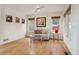 Bright and airy living room featuring hardwood floors, neutral tones, and ample natural light at 20875 E Girard Pl, Aurora, CO 80013