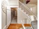 Charming wine cellar beneath stairs, featuring wooden floors and storage for wine bottles at 780 N Lafayette St, Denver, CO 80218