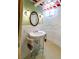 Stylish bathroom featuring a unique vanity sink with tiled walls and modern fixtures at 780 N Lafayette St, Denver, CO 80218
