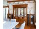 The dining room features a large antique buffet, decorative wallpaper border and hardwood floors at 780 N Lafayette St, Denver, CO 80218